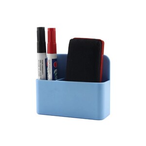 May include: A light blue plastic desk organizer holding a black marker, a red marker, and a black eraser. The organizer has two compartments and a curved back. The markers have white labels with black and red text.