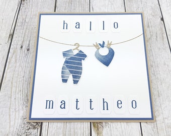 Greeting card for the birth of a boy, baby card blue with desired name