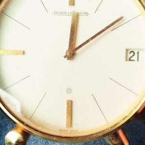Jaeger LeCoultre gilt brass vintage desk clock Ref.425, circa 1960 A gilt-brass keyless winding 8-day duration desk clock, Jaeger LeCoultre