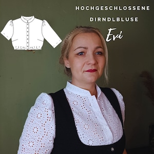 May include: A white, high-necked blouse with a lace pattern and a button closure. The blouse is cropped and has a fitted silhouette. The text "HOCHGESCHLOSSENE DIRNDLBLUSE Evi" is visible in the image.