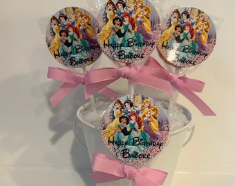 12 Two inch Princess personalized Birthday Lollipops. Lollipops are Two inches round.