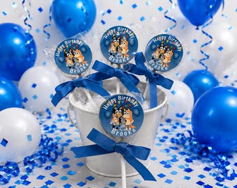 15 Bluey Personalized Birthday Lollipops. Blue or Pink Lollipops are ONE AND a HALF inches or 1 3/4 inches round.