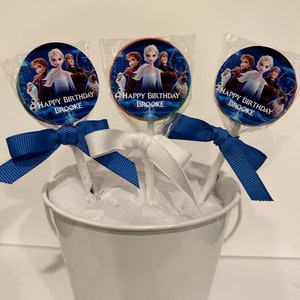 15 Frozen Personalized Birthday Lollipops. Lollipops are ONE AND a HALF inches round.