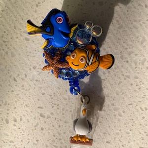 Disney’s Finding Nemo Dory and Nemo handmade badge reel.