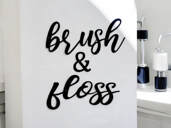 Flush and wash brush and floss sign | bathroom decor | cursive font words | bathroom signs | laser cut steel | waterproof powder coat |