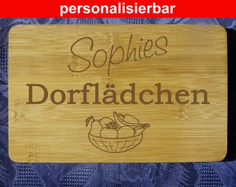 Houten bord snijplank met individuele tekst, motief "Koopmanswinkel 1 - 22 x 14 cm, bamboe