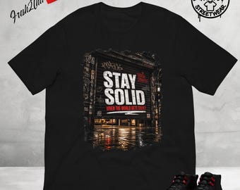 Camiseta Stay Solid a juego con las Jordan 12 Bloodline Bred, camiseta negra y roja estilo zapatillas, camiseta urbana Fresh2thatee, camiseta gráfica motivacional