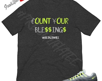 Camiseta "Cuenta tus bendiciones" / Camiseta de neón con burbujas grandes Max 95 / Camiseta urbana verde neón / Camiseta gráfica con el símbolo del dólar, el euro y el yen