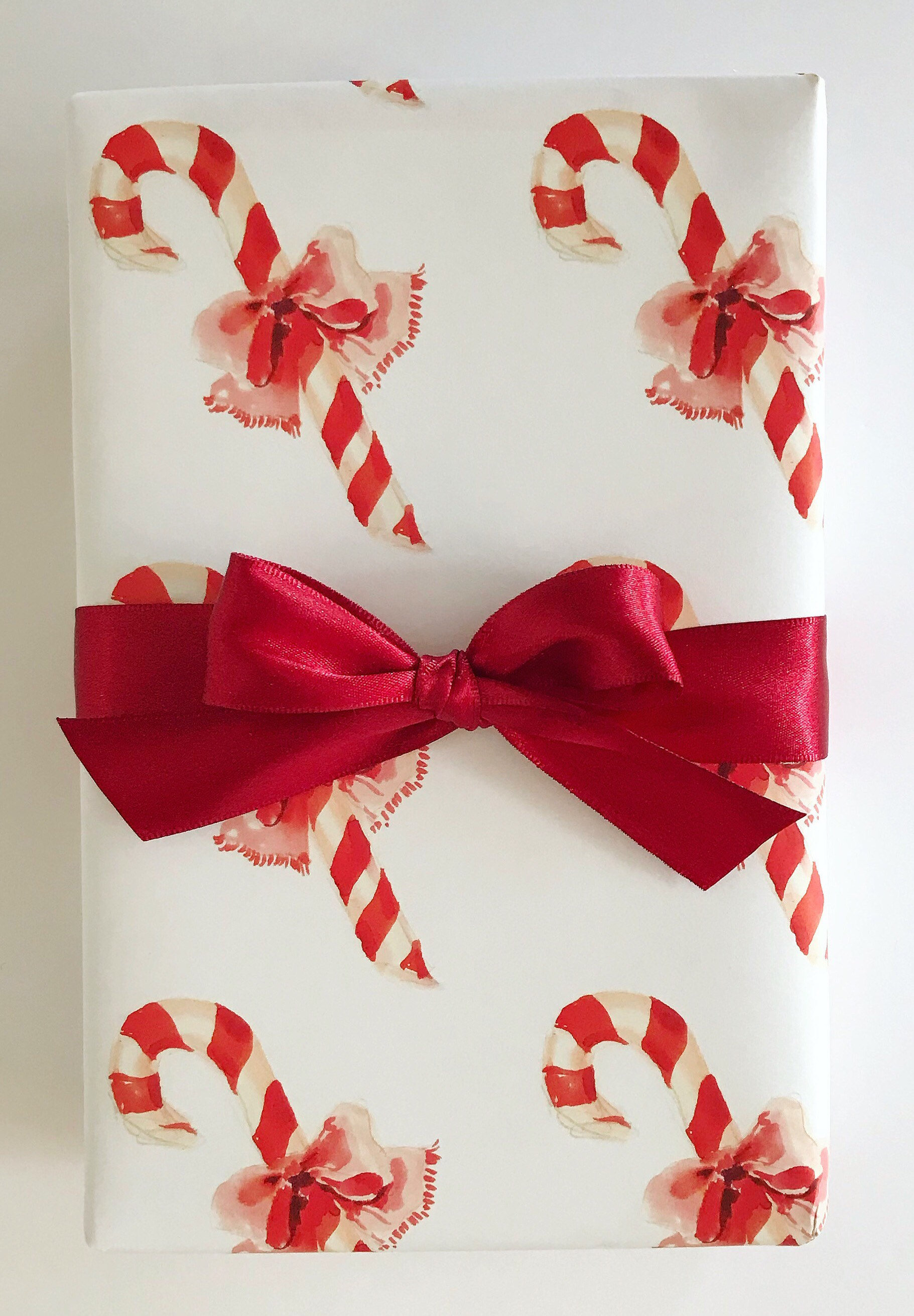 Gold Candy Canes and Holly on Red Christmas Tissue Paper