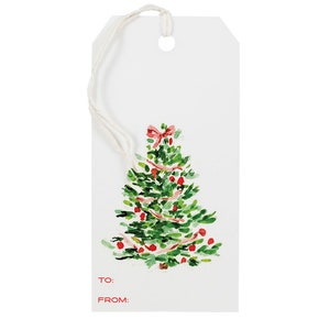 May include: White gift tag with a watercolor illustration of a Christmas tree with red ornaments and pink ribbon. The tag has the words "TO:" and "FROM:" printed in red.