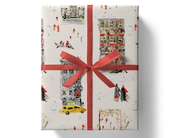 May include: Gift-wrapped present with a festive design. The wrapping paper features a watercolor illustration of buildings, people, and a yellow taxi. A red ribbon and bow secure the package, creating a visually appealing holiday gift.