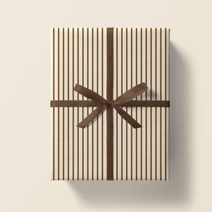May include: A brown and white striped gift box with a brown satin ribbon tied in a bow.