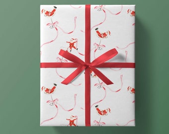 May include: White gift wrap with a red ribbon and a repeating pattern of Santa Claus riding on a pink ribbon.