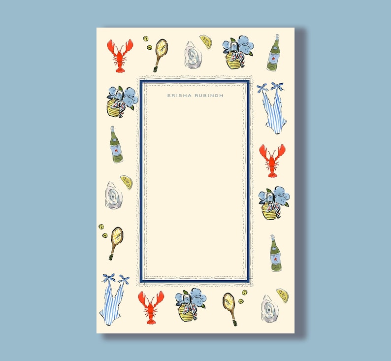 May include: Cream-colored stationery with a navy blue border and decorative illustrations. The border features a lobster, oysters, lemons, flowers, and bottles. The text "ERISHA RUBINOH" is printed in the center.