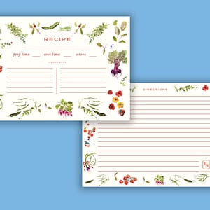 May include: Two white recipe cards featuring watercolor illustrations of vegetables and herbs. The front card includes fields for recipe title, prep time, cook time, serves, and ingredients. The back card features lined space for directions.