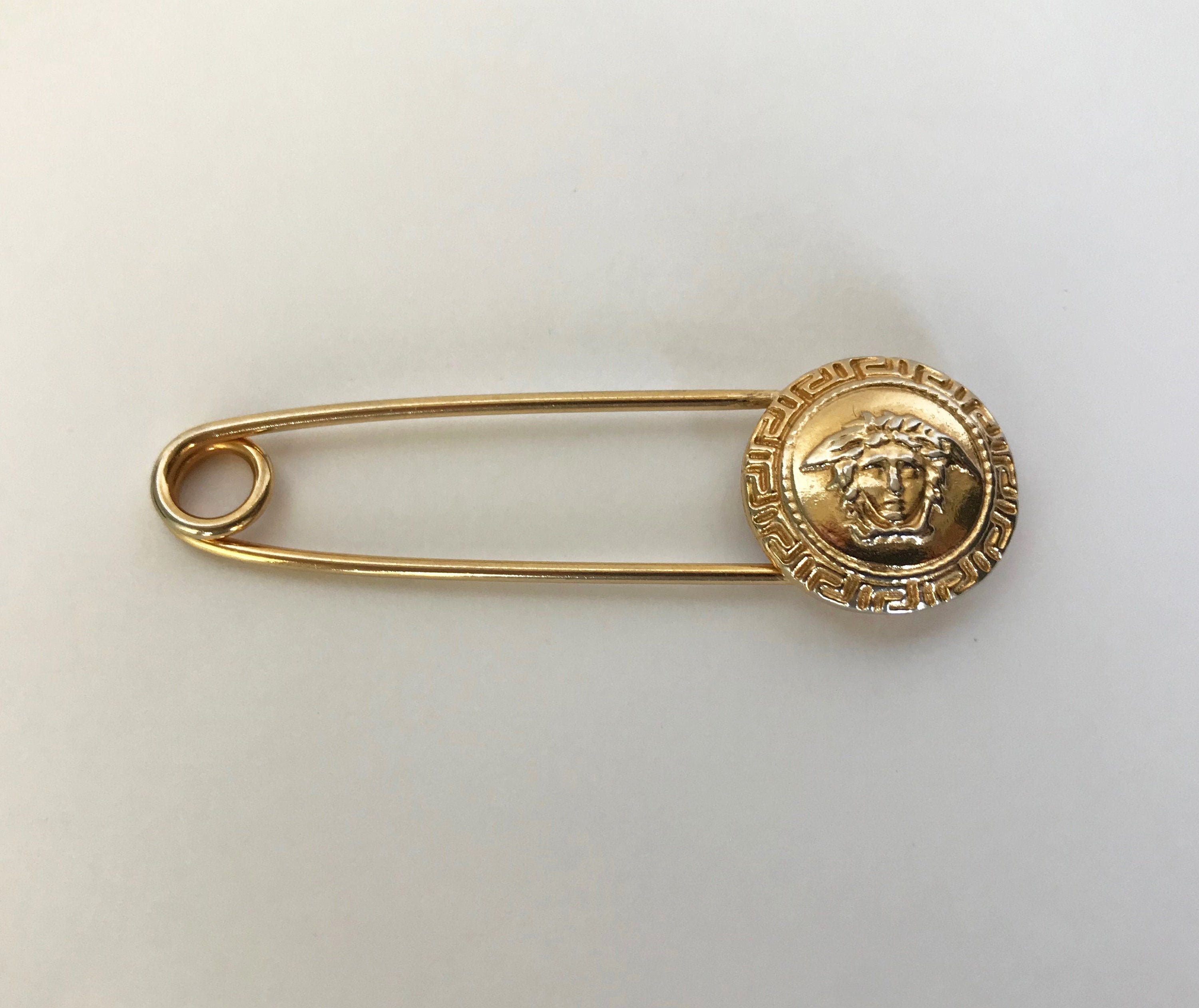 Vintage GIANNI VERSACE Medusa Head Pin at Rice and Beans Vintage