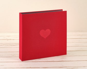 Linen wedding album with embossed heart and question pages