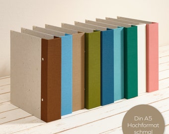 A5 album portrait format with retro colored linen spine. Personalization possible