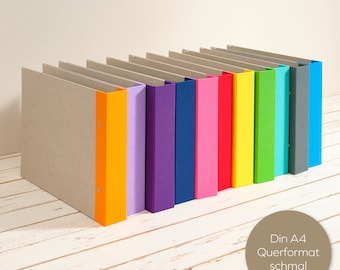 A4 album landscape format with colored linen spine and 2-fold mechanism as a layflat folder. Decorative for office or living area