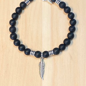 Bracelet sud-ouest homme, bracelet de perles noir mat, bracelet plume homme, bracelet de perles noires homme, bracelet noir homme, cadeau petit ami