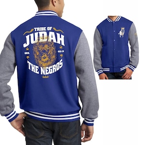 May include: A blue and gray varsity jacket with a lion graphic on the back. The graphic says "Tribe of Judah" and "The Negros" with the Bible verse "Gen. 49:8-10".