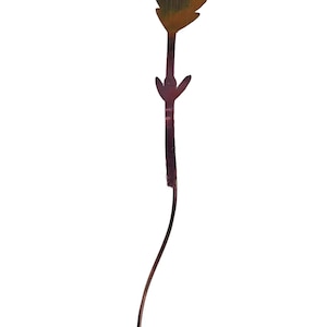 May include: A gold metal stem with a series of leaf-shaped cutouts. The stem is bent into a curved shape.