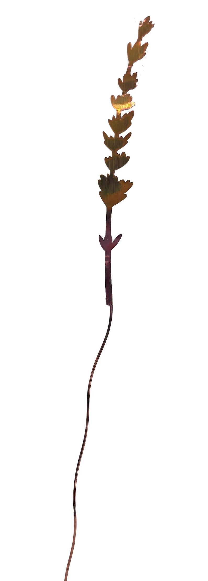 May include: A gold metal stem with a series of leaf-shaped cutouts. The stem is bent into a curved shape.