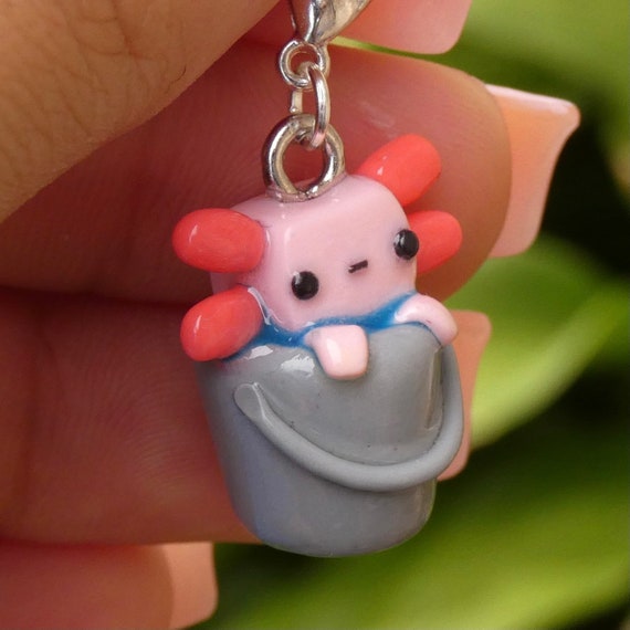 I made some cute axolotl charms! I used translucent white and red