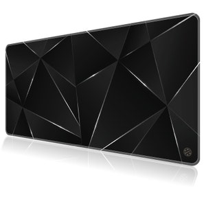 May include: Black gaming mouse pad with a geometric pattern of silver lines. The mouse pad has a subtle sheen and a logo in the lower right corner.