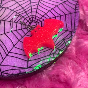 neon pink glitter bat dangle earring