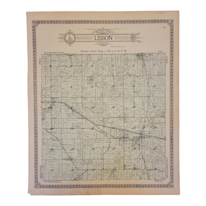 May include: A vintage map of Lisbon Township, showing the township's layout with numbered sections and roads. The map is printed on aged paper with a decorative border.