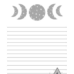 May include: A lined journal with a gray moon and stars design at the top and a gray triangle with hands holding a crescent moon and stars at the bottom.