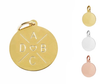 May include: Gold, silver, and rose gold round disc charms with a heart and initials A, B, C, and D engraved on the gold charm.