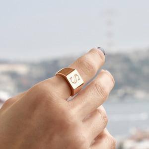 Louis Vuitton 2000s Gold Monogram Square Signet Ring · INTO