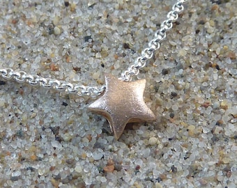 small star pendant with pea chain, red gold 585