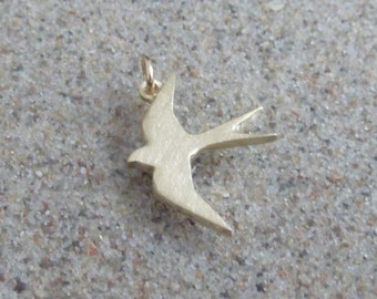 Swallow, pendant, yellow gold 333, without chain