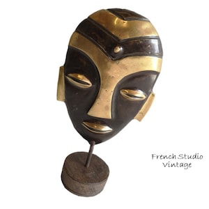 Vintage Brass Face Mask: African Art Ornament on Wood Base
