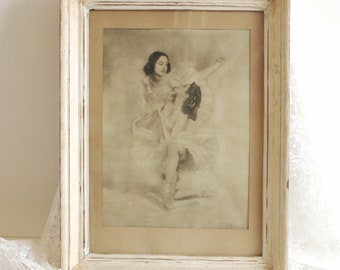 May include: A framed black and white photograph of two ballerinas in mid-pose. The ballerinas are wearing tutus and are gracefully intertwined.