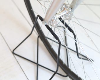 Stainless steel bike stand with spoke protection - black paint w/ black wrap | 26" - 27.5" - 28" wheels | metal bicycle rack