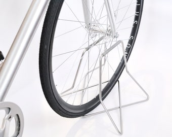 Stainless steel bike stand with spoke protection - silver grey | 26" - 27.5" - 28" wheels | metal bicycle rack | S+Stand