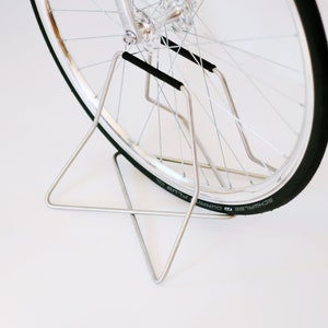 Stainless steel bike stand with spoke protection - black | 26&quot; - 27.5&quot; - 28&quot; wheels | S+Stand