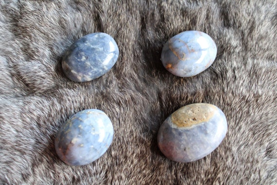 Small blue opal palmstones