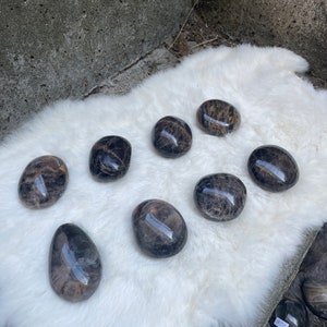 M black moonstone palmstone