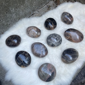 L black moonstone palmstone