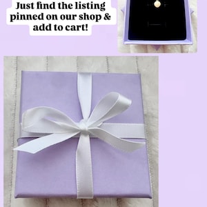 May include: A lavender gift box tied with a white satin ribbon. The text on the image reads "Optional Add-On: Memento Gift Box" and "Just find the listing pinned on our shop & add to cart!" A necklace is displayed in a box and a jewelry bag.