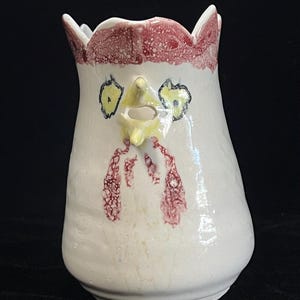 Vintage handmade chicken or rooster creamer pitcher.