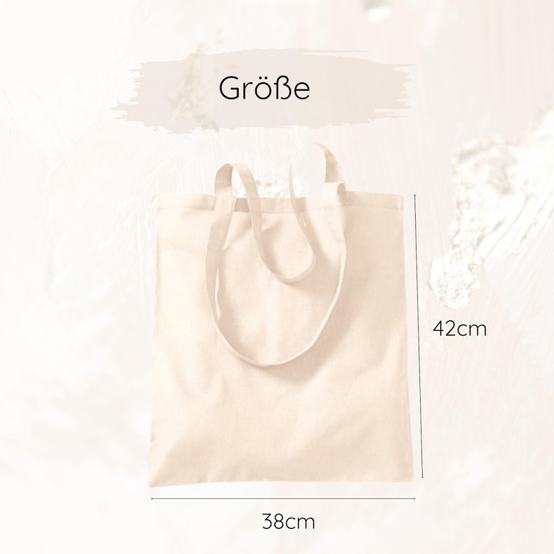 May include: A beige tote bag with a rectangular shape and two handles. The bag measures 38cm wide and 42cm high. The word "Gr&ouml;&szlig;e" is written in black text above the bag.