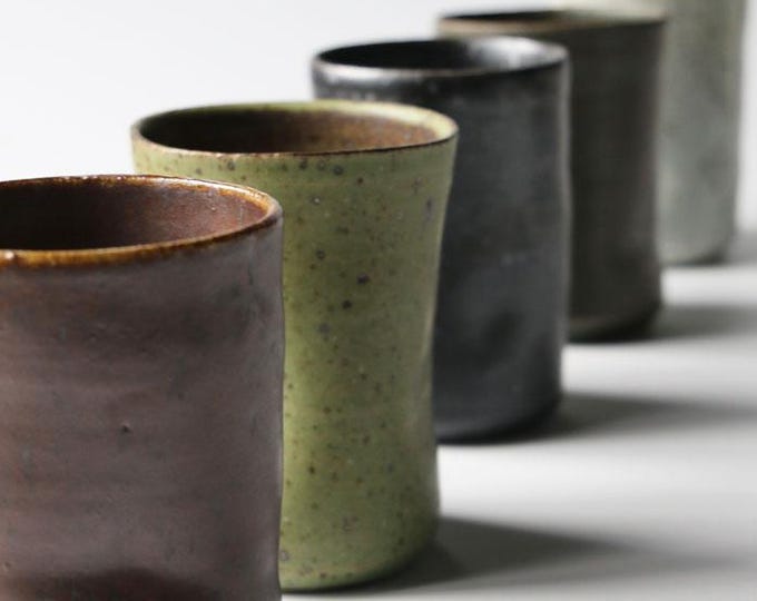 Artisan Thumb Grip Coffee Mug: Handmade Glazed Ceramic Tea Cup