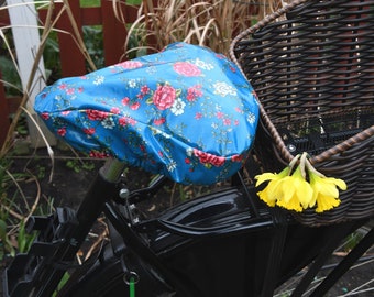 Wasserabweisender Fahrradsattelüberzug / Fahrrad Sattelbezug / Regenschutz /  "Blumen auf petrol"