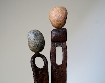 Iron figure / art figure / pair of figures made of iron with stone head / figure made of iron